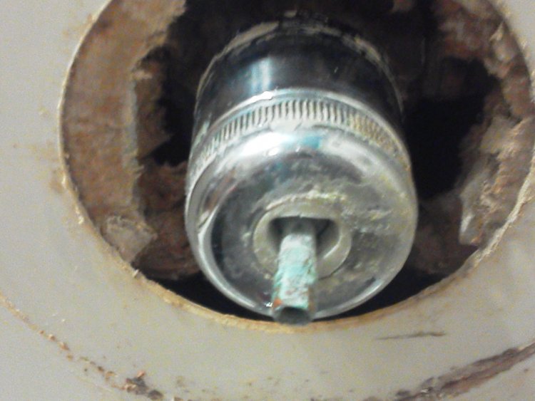 Changing the cartridge in an old shower.