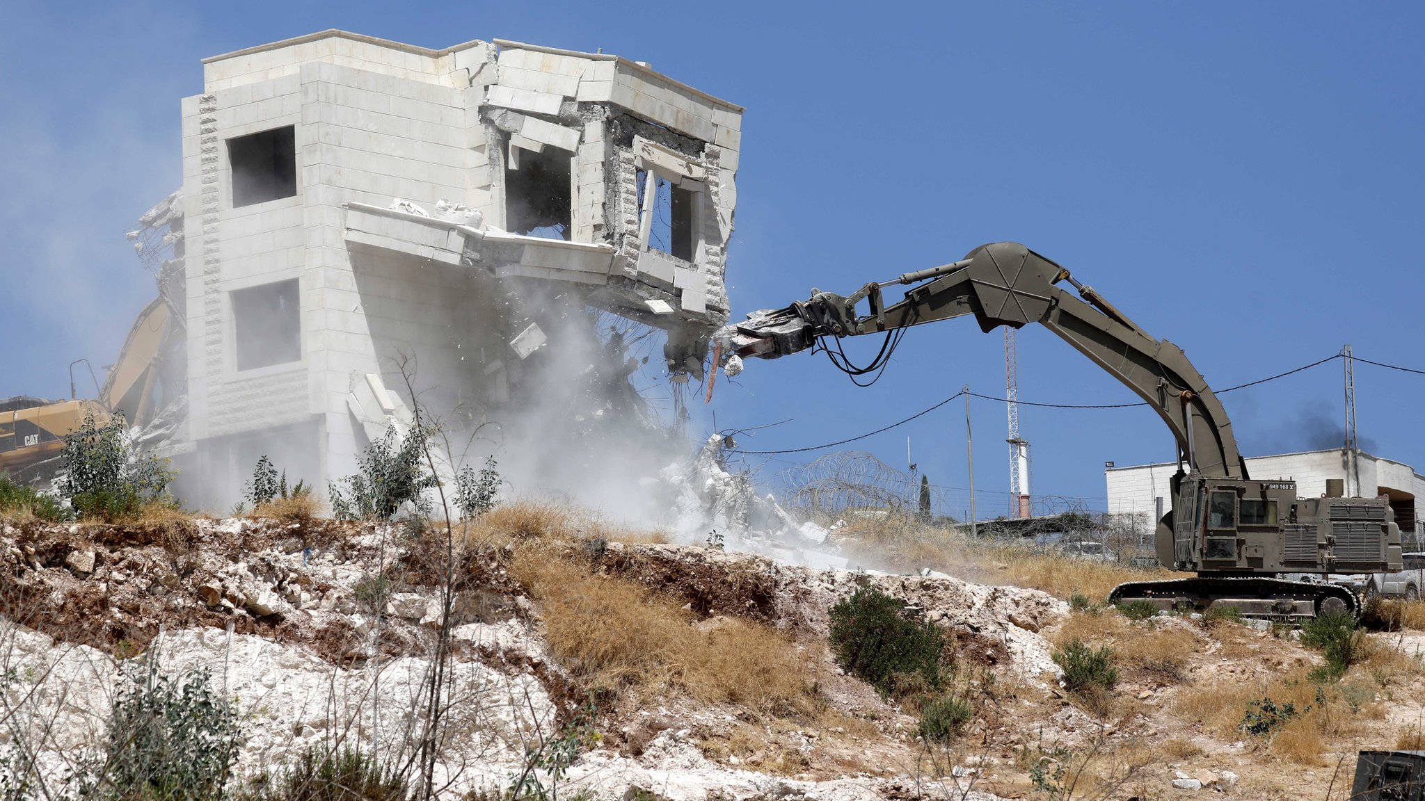 Name:  Bulldozed Palestinian House.jpg
Views: 27
Size:  540.3 KB