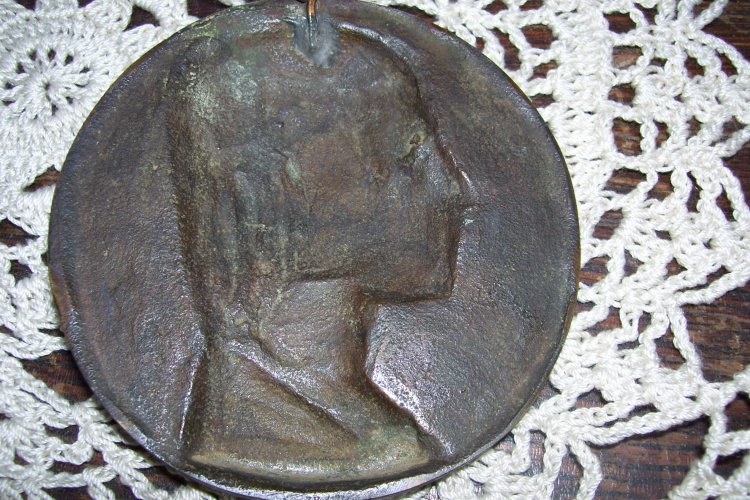 Trying to identify Initials on bronze relief