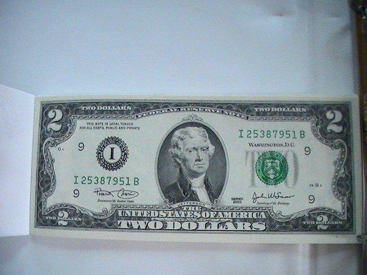 I have 25 2003 two dollar bills. The ink is faded in a few ...