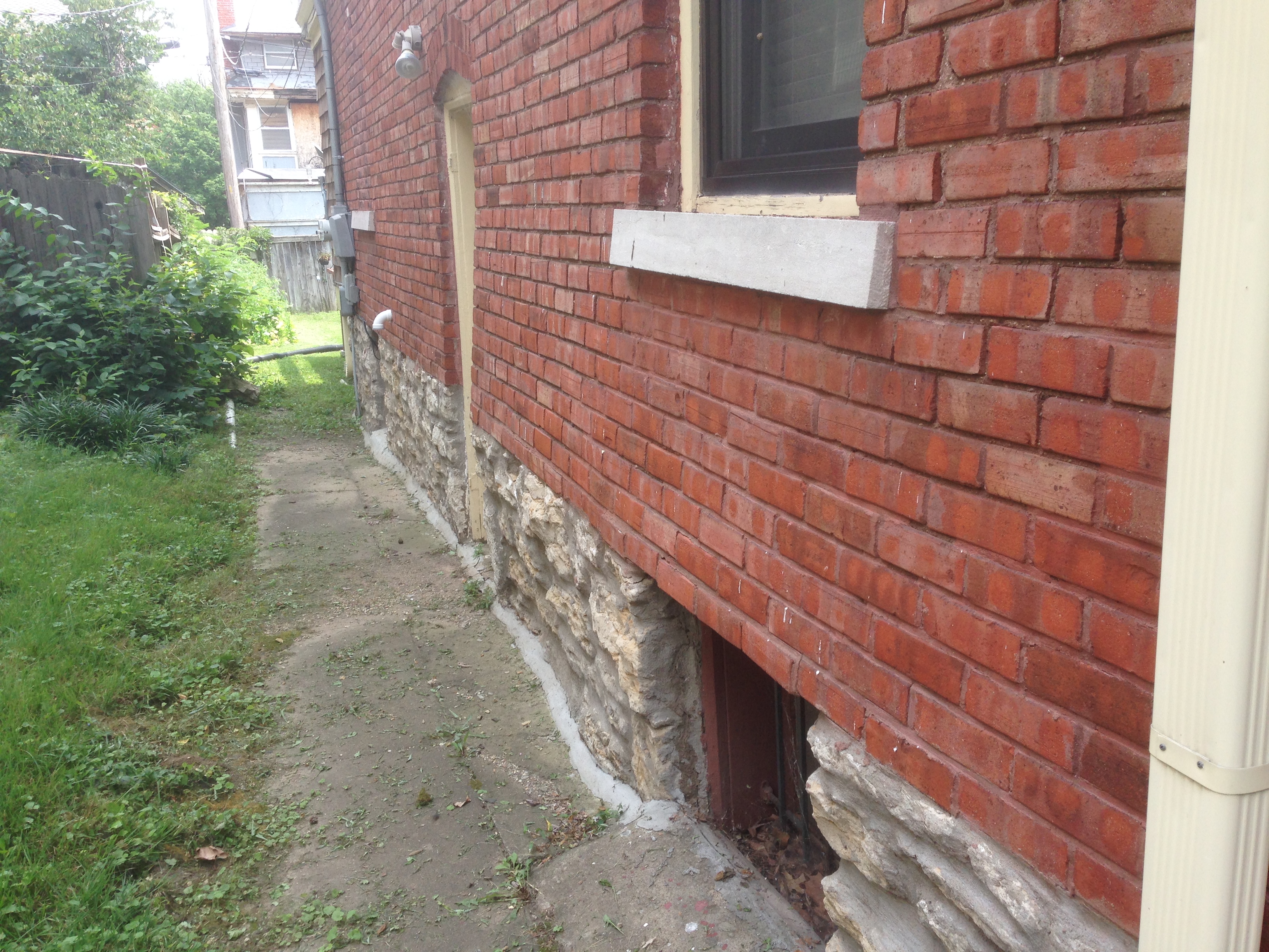 Exterior wall brick bowing out