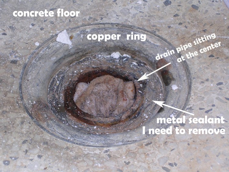 Metal sealant around shower drain