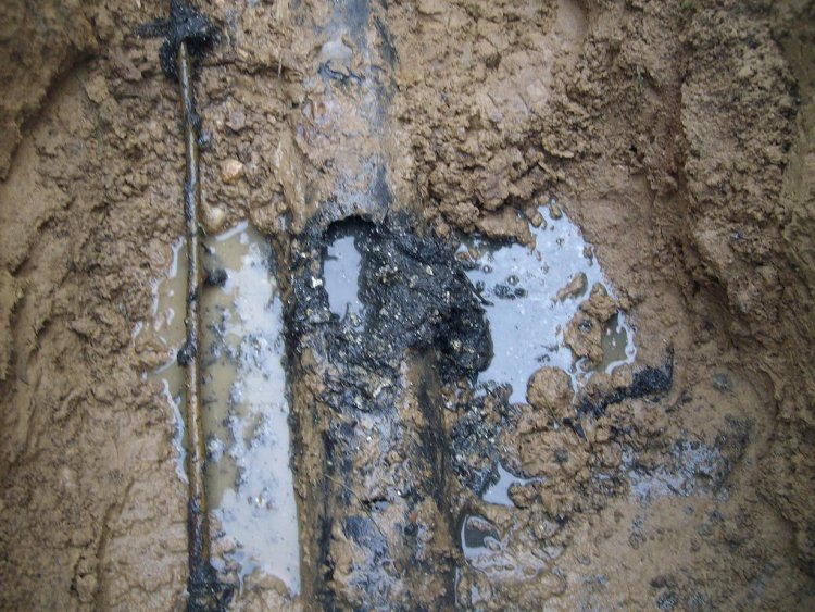 How can you fix a clogged septic drain field?