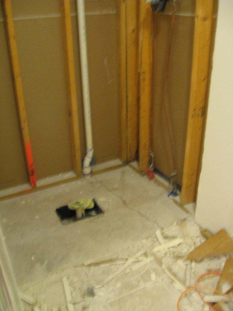 How to remove a fiberglass tub and shower assembly?