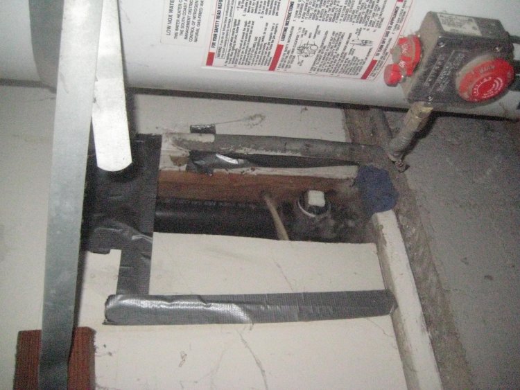 Concrete poured down a shower drain.