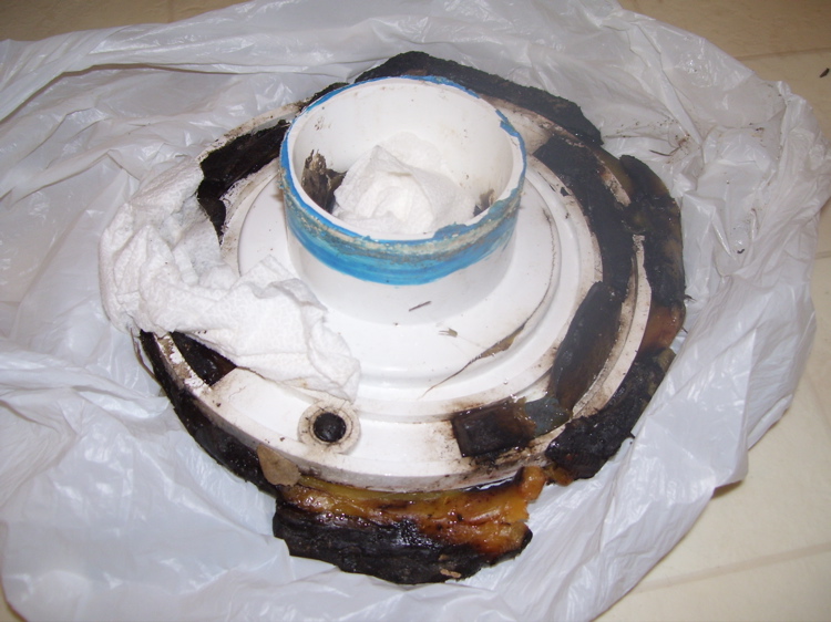 Toilet drain pipe below floor; need to replace flange