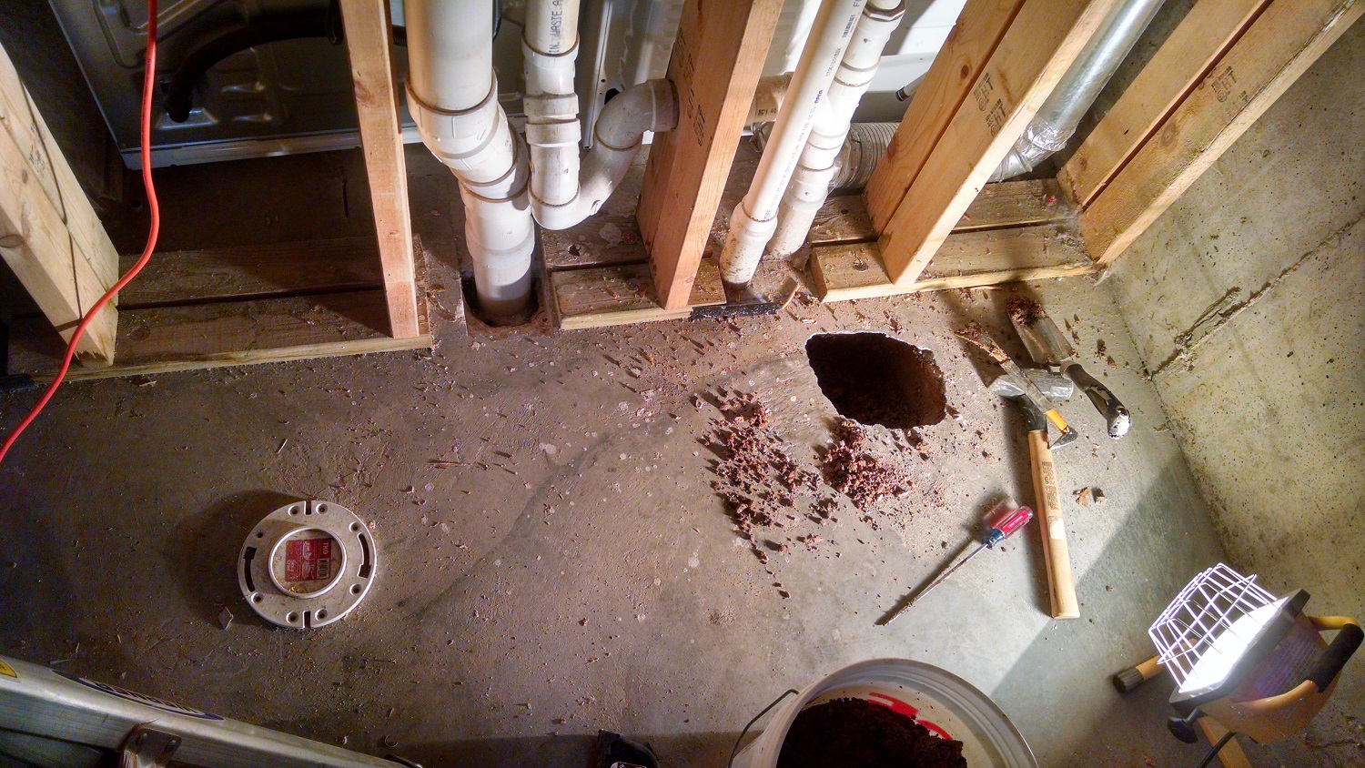 Finding new shower drain in basement under concrete