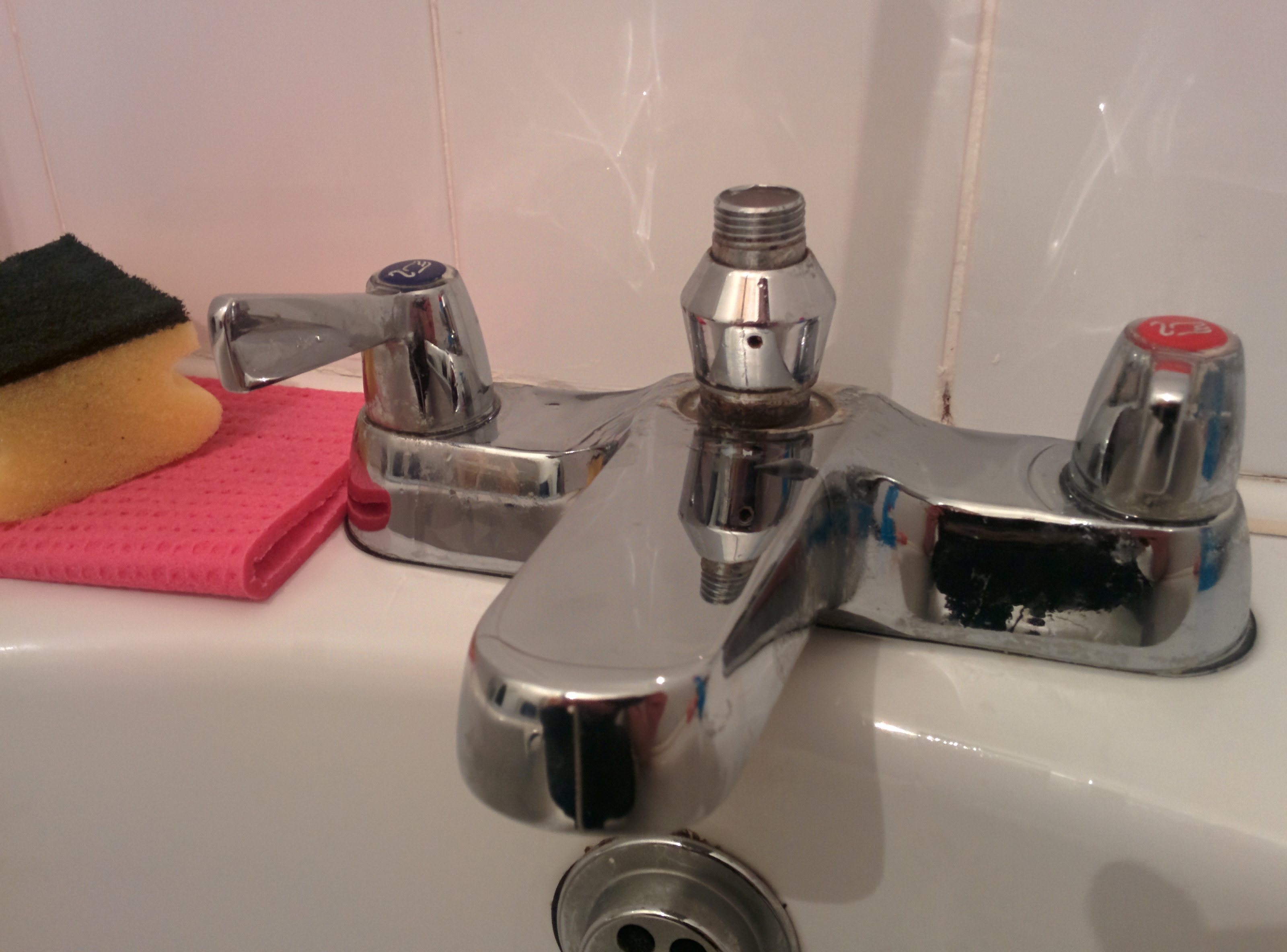 How do I fix a combined faucet mixer and push down shower