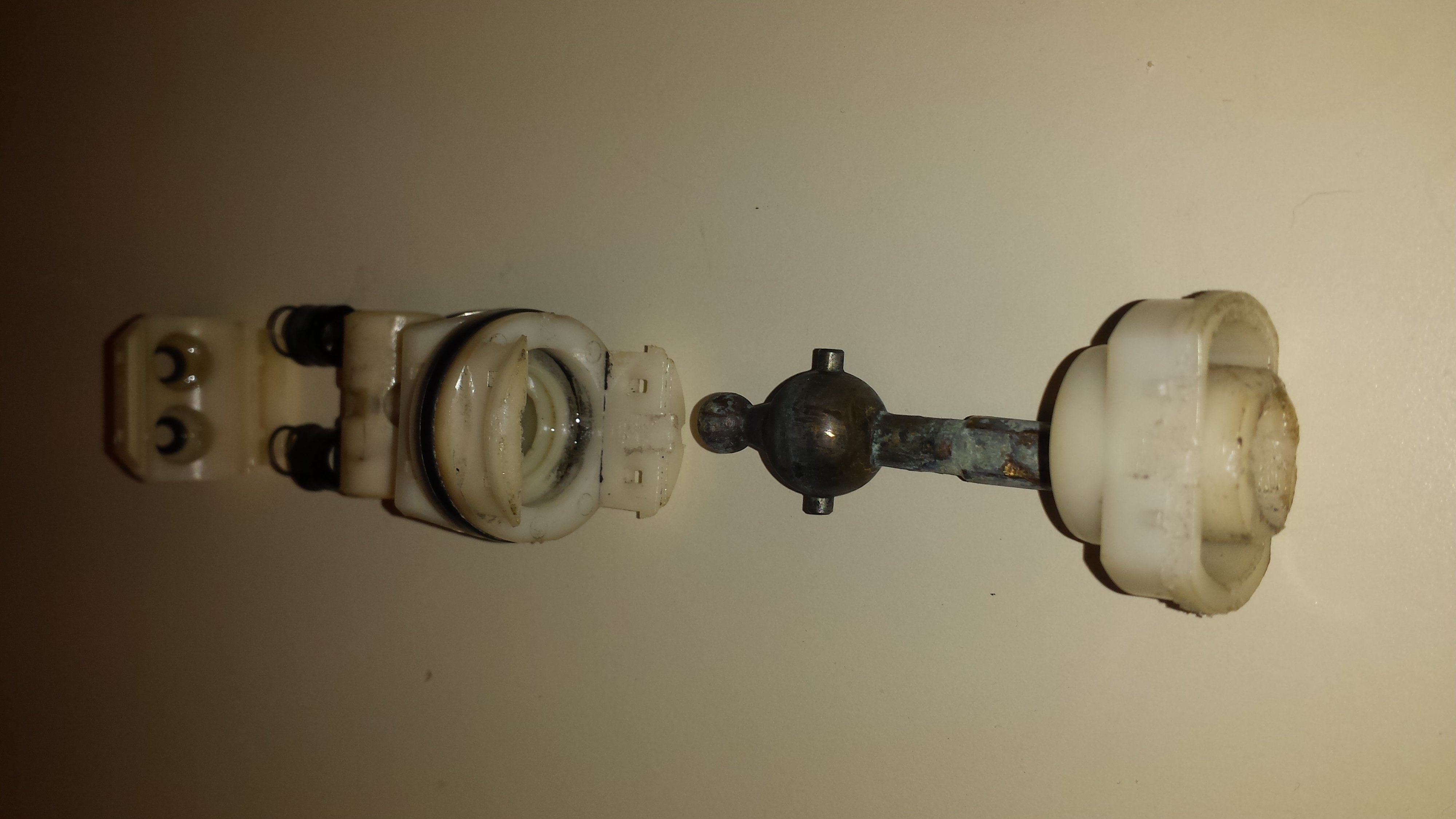 Changing the cartridge in an old shower.