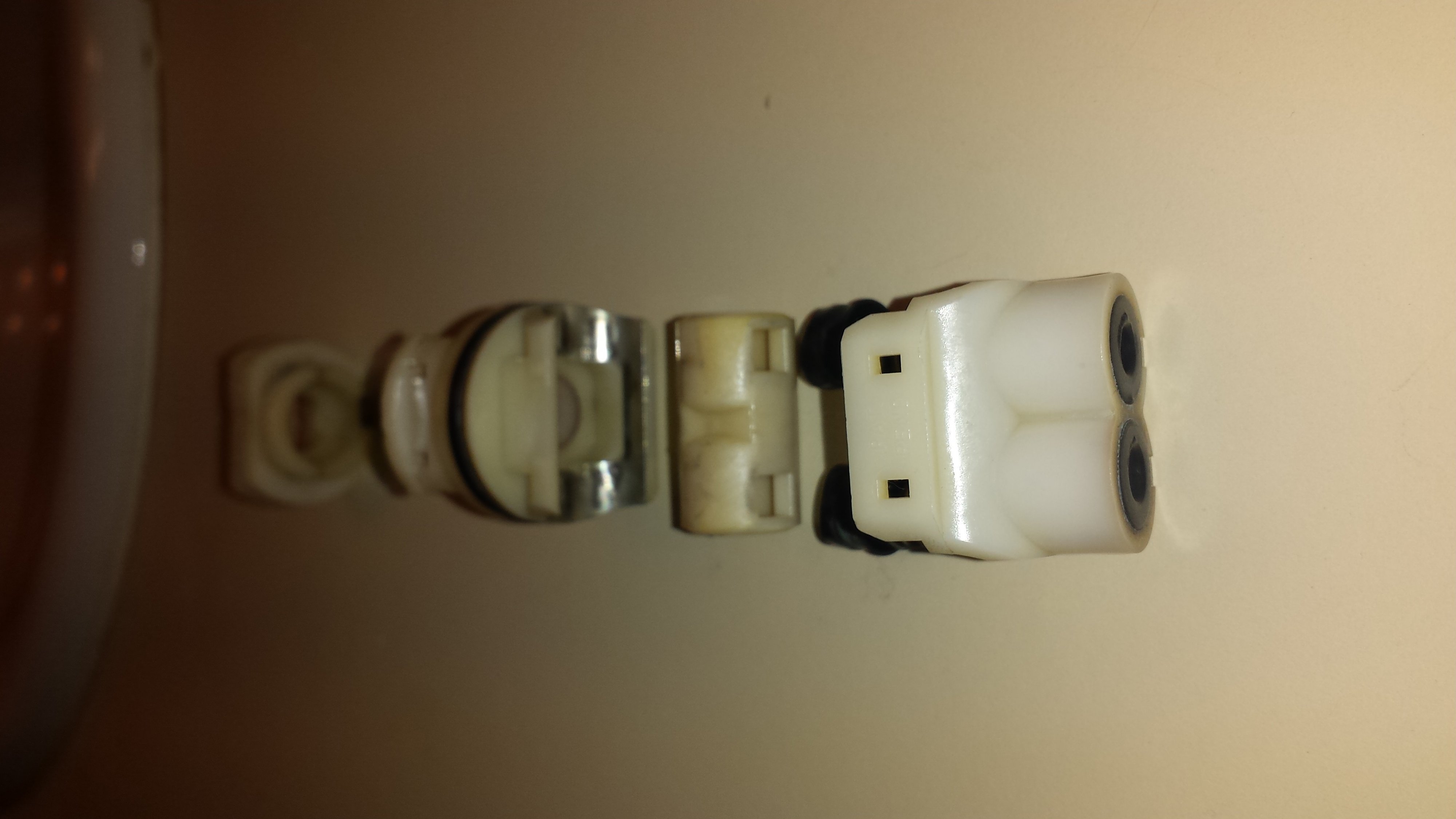 Changing the cartridge in an old shower.