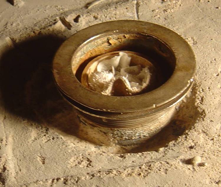 Removing shower base in basement